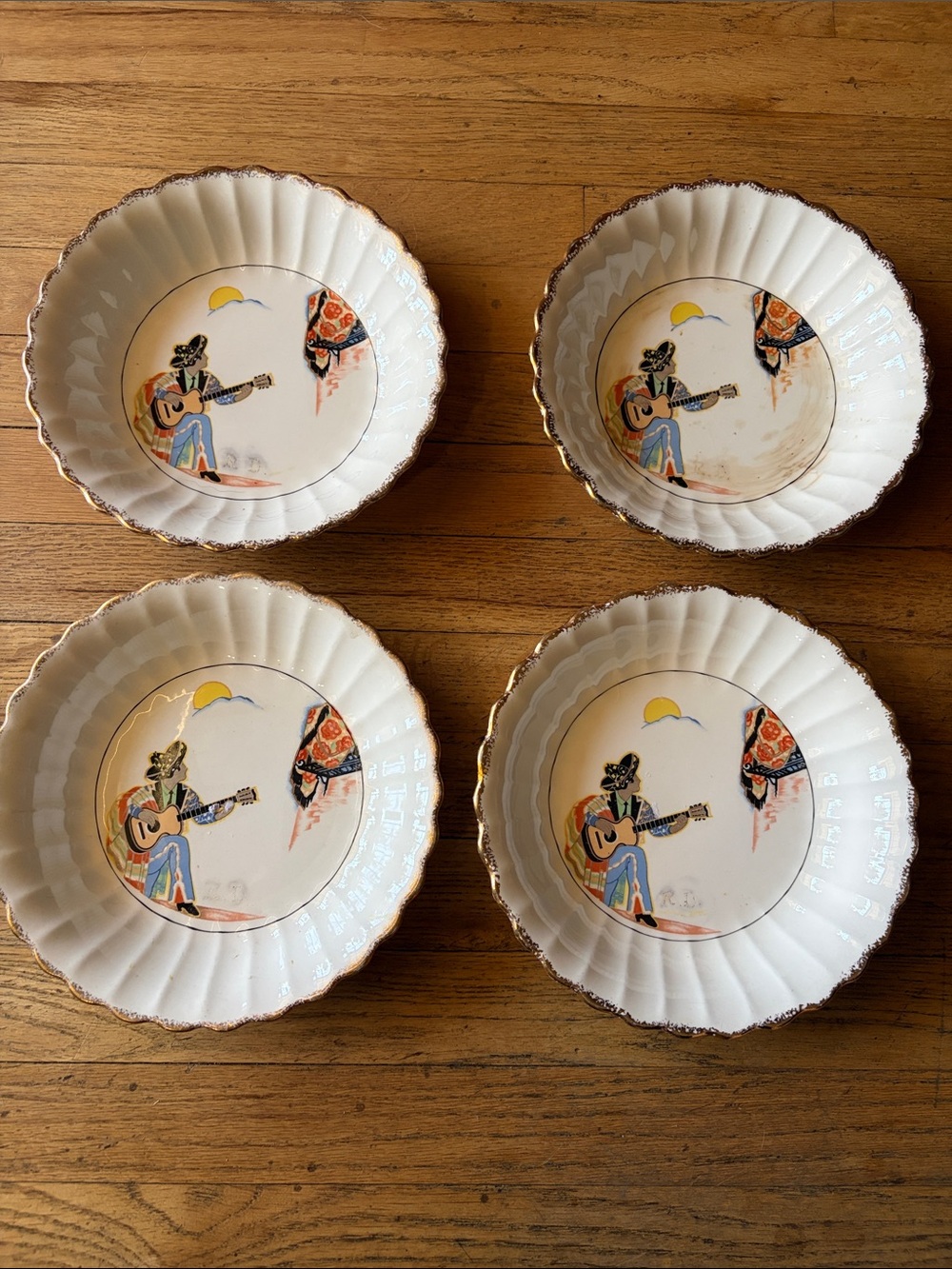Set of 4 Decorative Scalloped Ceramic Bowls with Guitar Player Motif